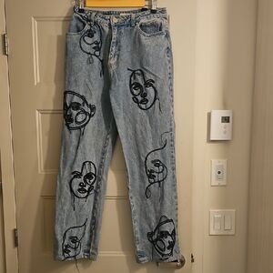 Maniere De Voir Light Blue Straight Leg Jeans with Black Embroidered Faces